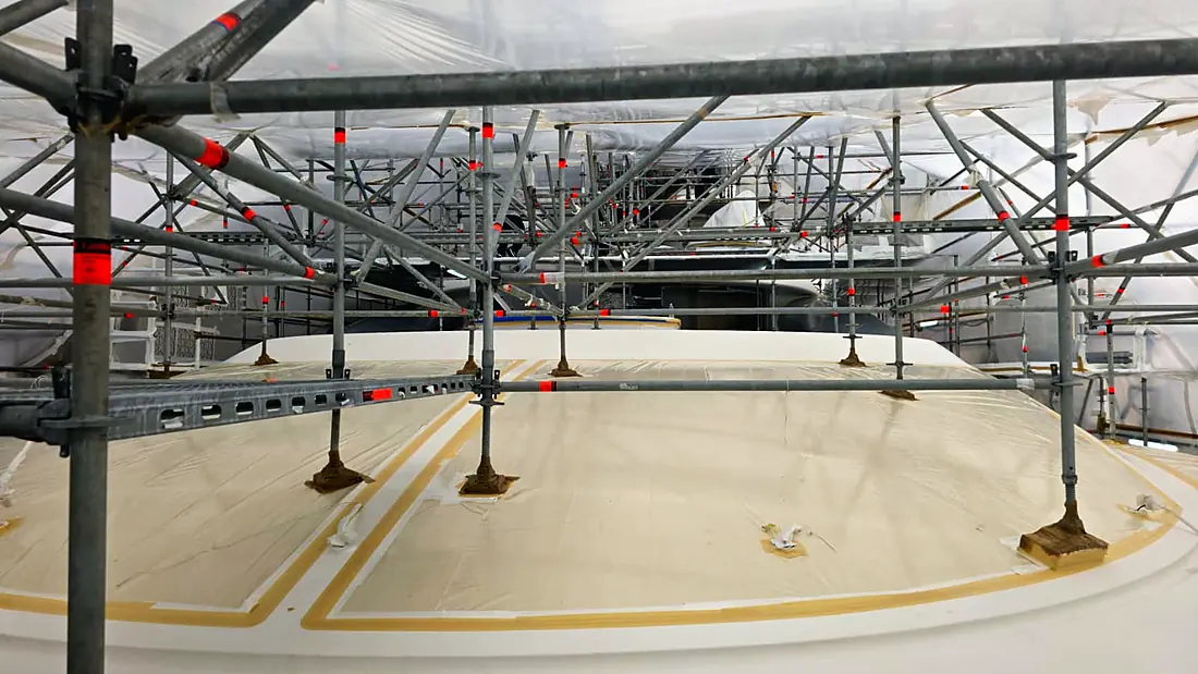 Scaffolding and containment built over the masked deck